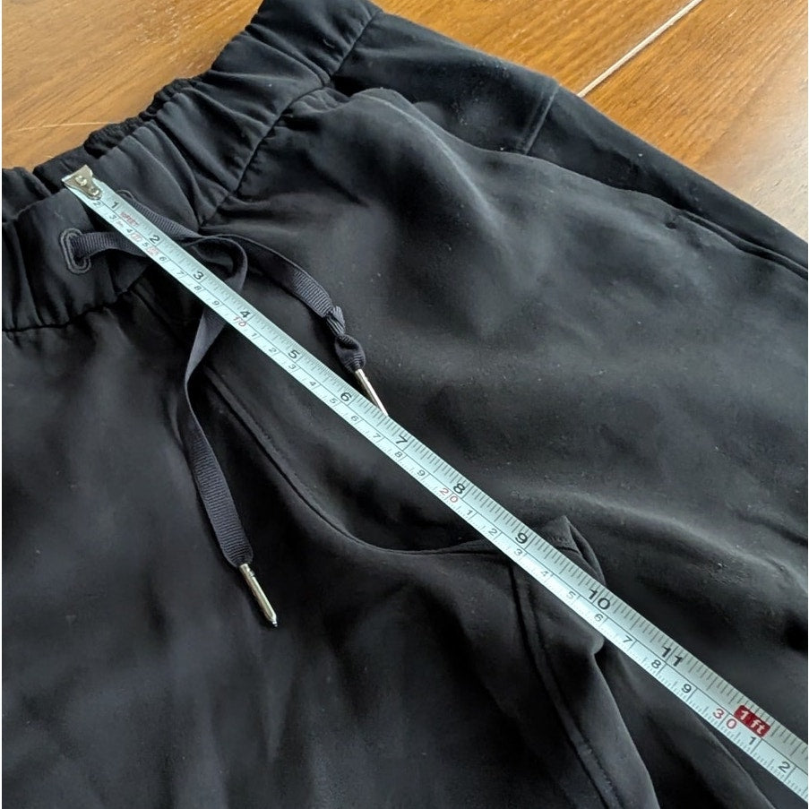 Lululemon W5BZDS Black On The Fly Jogger Tapered Leg Mid-rise Pants, size 2