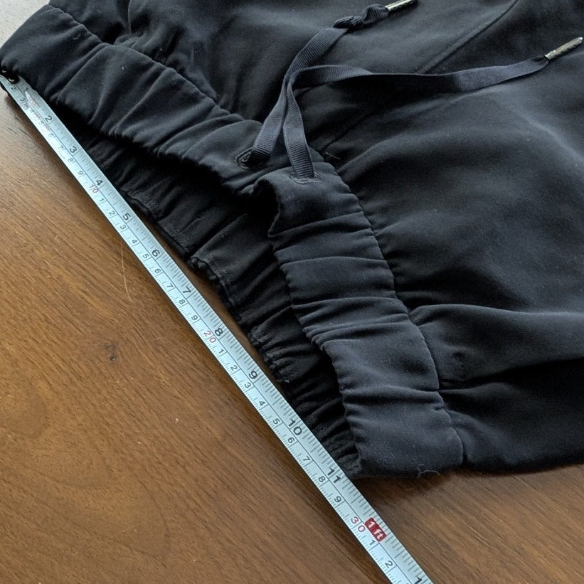 Lululemon W5BZDS Black On The Fly Jogger Tapered Leg Mid-rise Pants, size 2